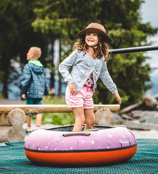 Girl standing in a rubber dinghy